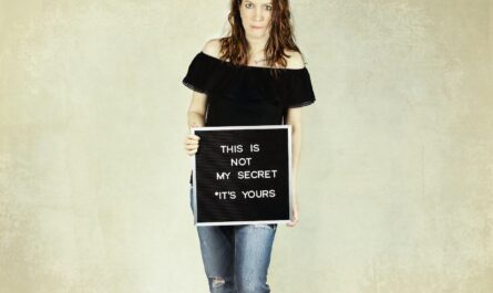 woman holding signage