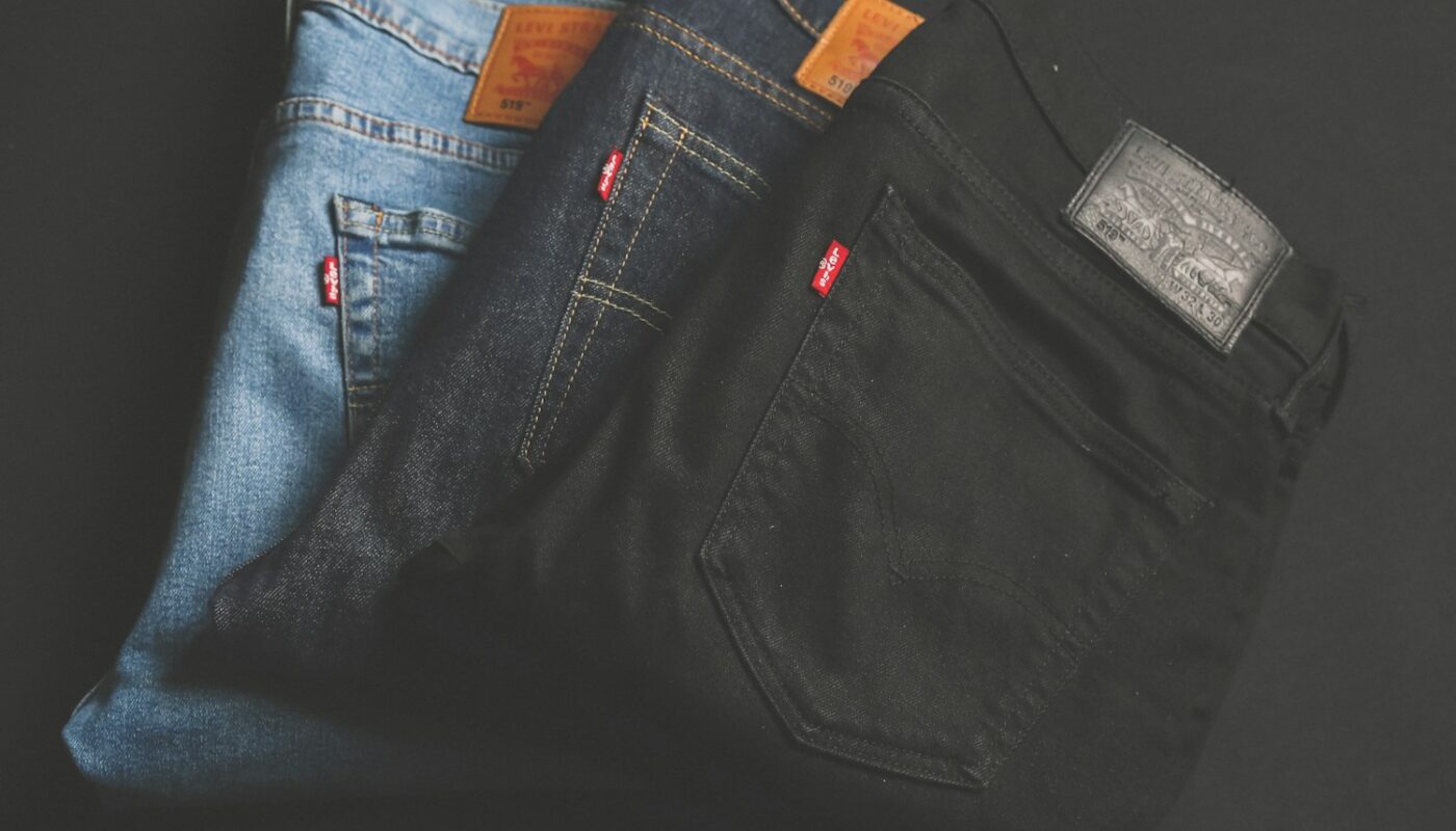 three assorted-color denim bottoms